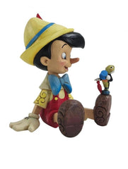 Figura enesco disney pinocchio sentado & pepito grillo